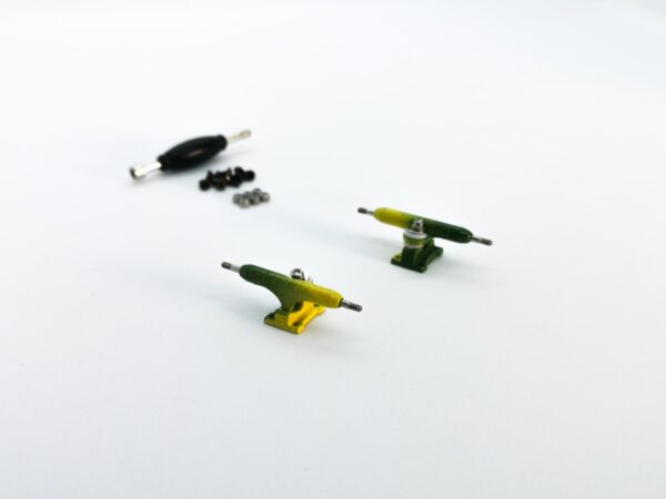Product image of Green and Yellow Fingerboard Trucks 32mm